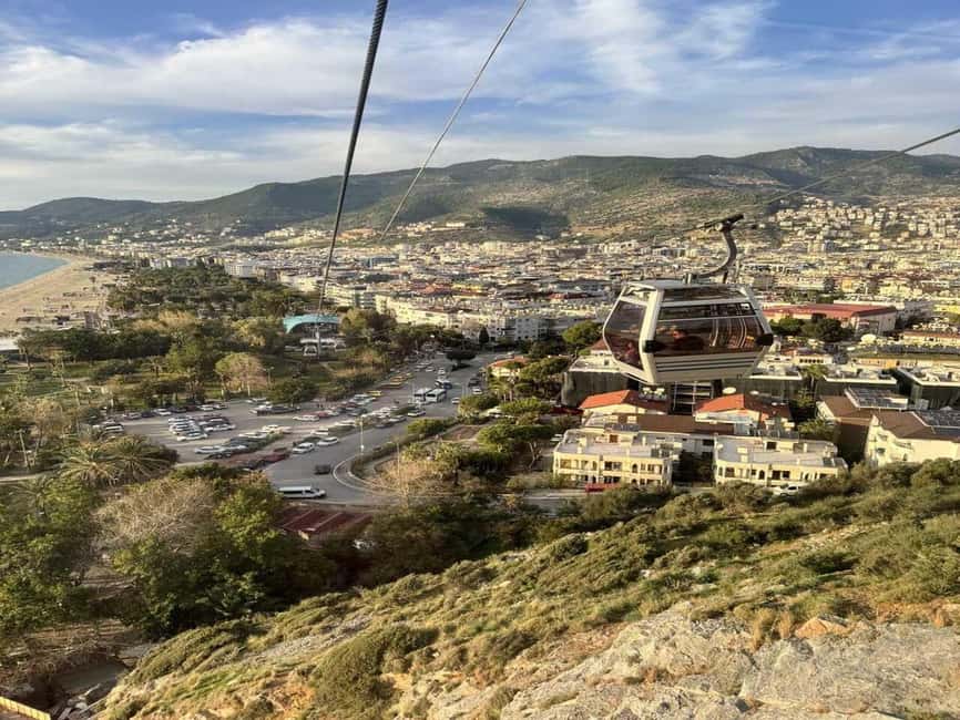Alanya Night City Tour: Castle, Cleopatra Beach & Cable Car - Taking the cable car toward Alanya Castle