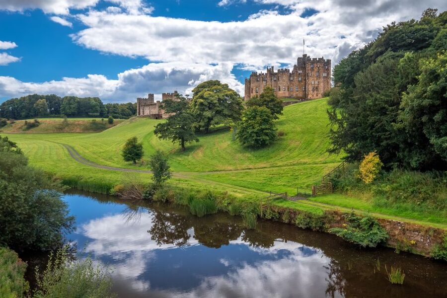 Alnwick Castle and Scottish Borders Tour from Edinburgh - Bamburgh beach and the castle on the rock