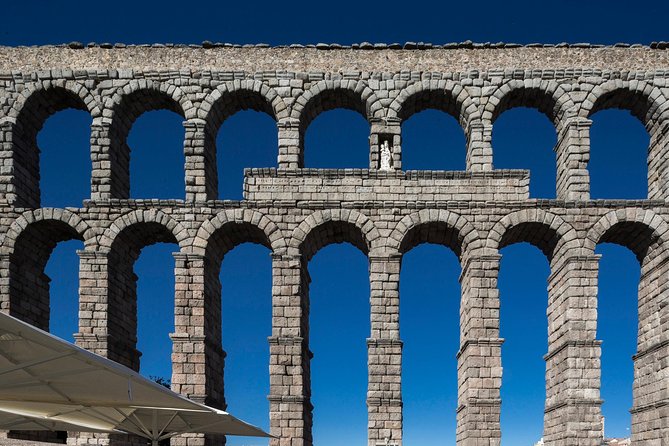 Avila with Walls and Segovia with Alcazar from Madrid - Walking through Segovia’s old quarter