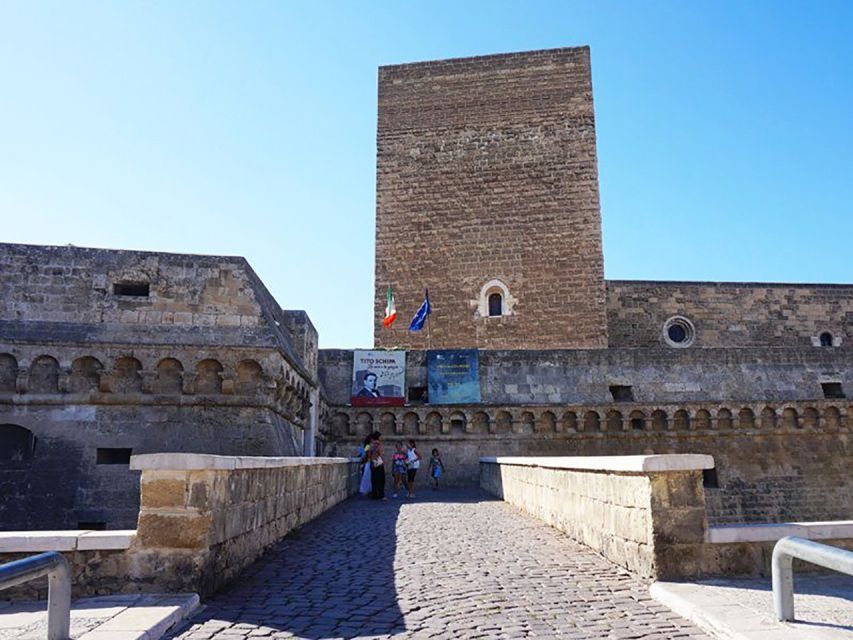 Bari: Norman-Swabian Castle Guided Tour - The courtyard, moat, and three stone towers