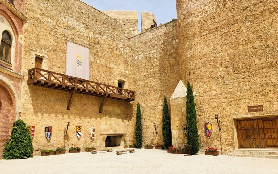 Belmonte Castle Entry Ticket with Audio Guide - Crossing the drawbridge and entering the field gate