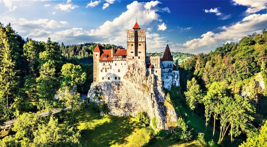 Bucharest: Peles Castle, Bran Castle, & Brasov Old Town Tour - Through the Carpathians into Transylvania