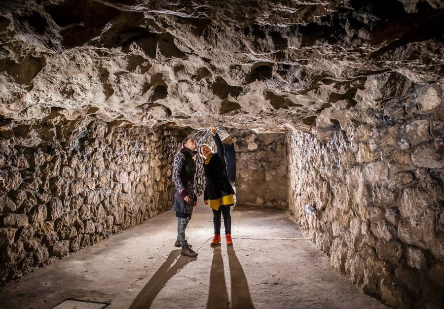 Budapest: Buda Castle Cave Tour - From Medieval Cellars to Wartime Shelters