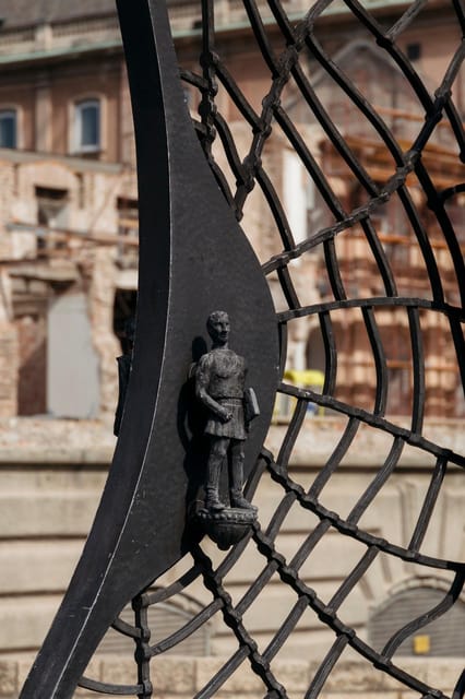 Budapest: Buda Castle Walking Tour & Folk Music Performance - Tárnok Street and old architectural layers