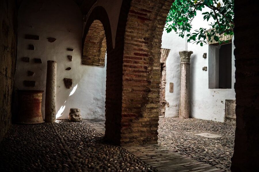 Cordoba: Alcázar de los Reyes Cristianos 1-Hour Guided Tour - The Women’s Courtyard and prison history