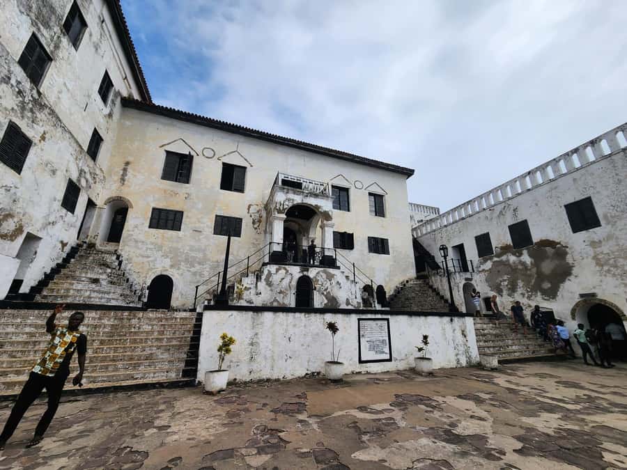 Discover Cape Coast and Elmina Castle with Kakum - Cape Coast town, food, and local conversation