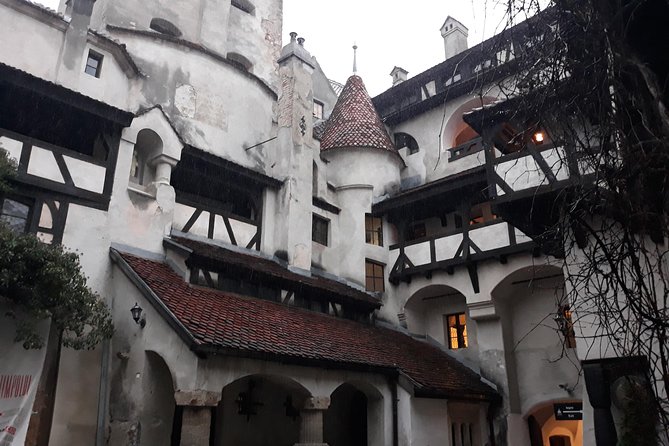 Dracula's Castle & Peles Palace Tour from Bucharest Including Brasov Old Town - Brasov Old Town in the late afternoon