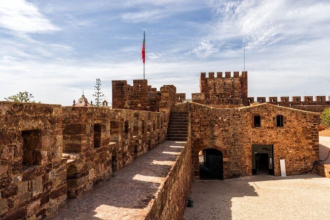 From Albufeira: Benagil Tour, Bones & Medieval Silves Castle - A fast tour of the Algarve coast and Silves