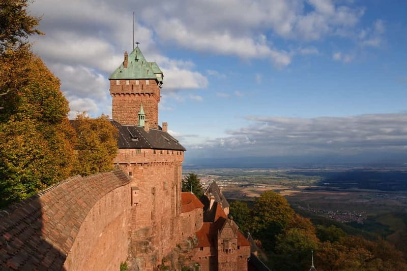 From Colmar: Haut-Koenigsbourg Castle and Villages Day Tour - Turckheim appears along the road to Riquewihr
