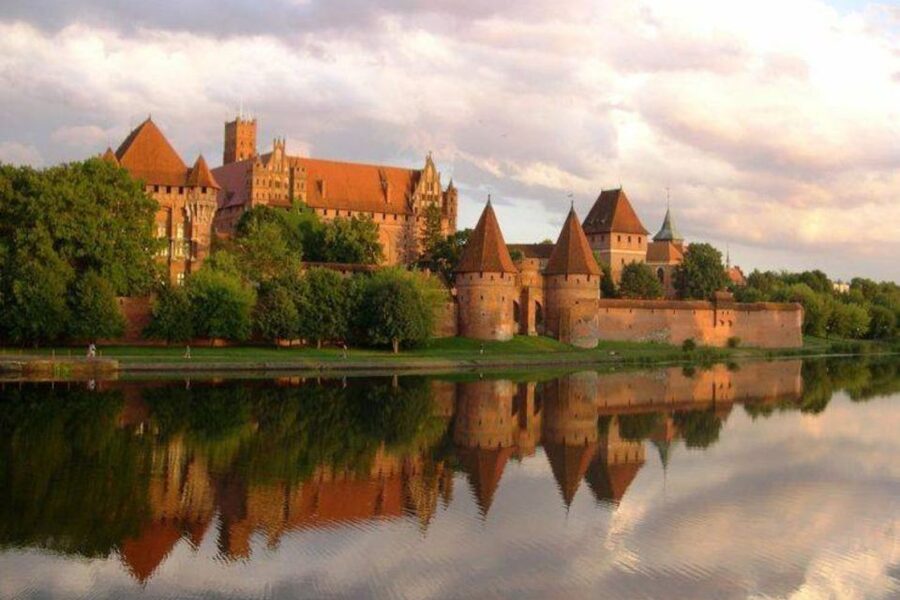 From Gdansk: Malbork Castle Trip with Ticket and Audio Guide - Entering the largest brick castle in the world