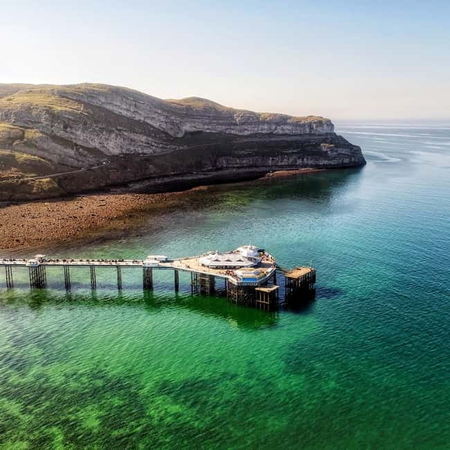 From Llandudno: Portmeirion, Snowdonia and Castles Tour - The Great Orme opens the route with sea views