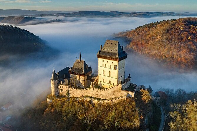 From Prague: Small-Group Karlstejn Castle & Koneprusy Caves Trip - The village below the castle
