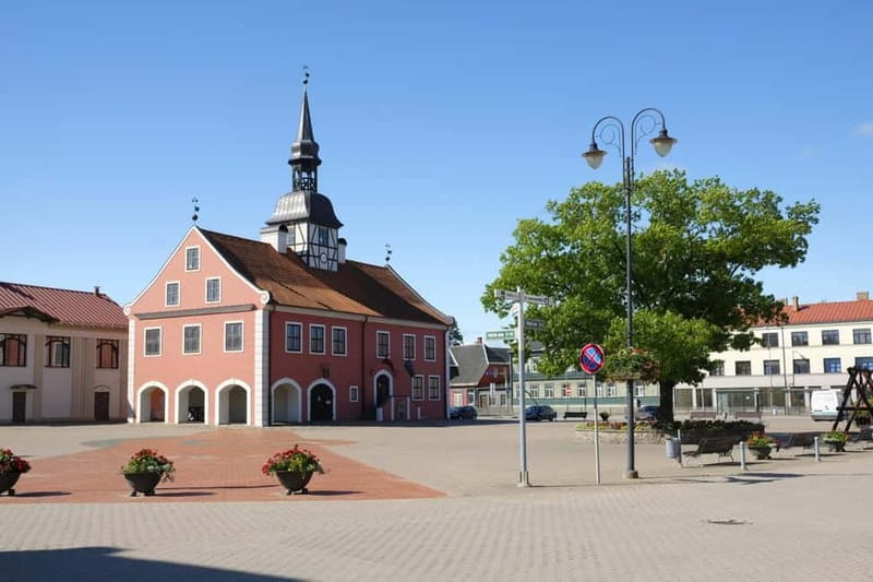From Riga : Rundale palace and Bauska castle tour and back. - Walking through Bauska toward the castle