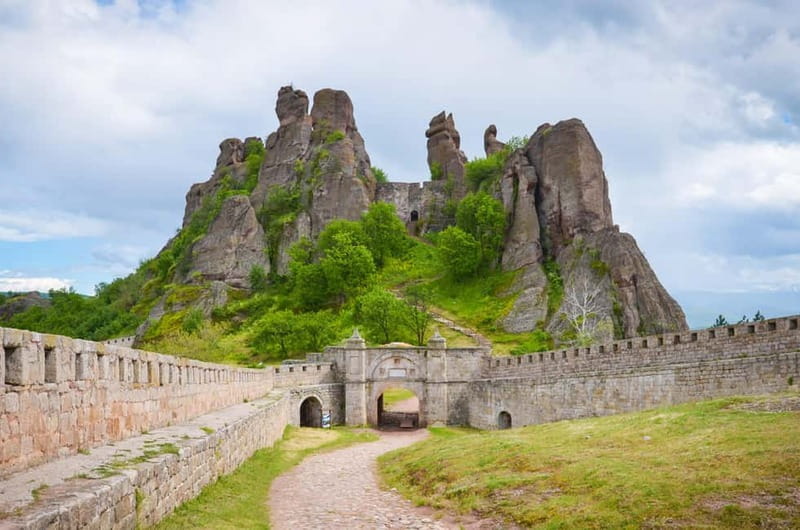 From Sofia: Belogradchik Fortress & Venetsa Cave 12 hrs Tour - Entering Belogradchik Fortress among the rock towers