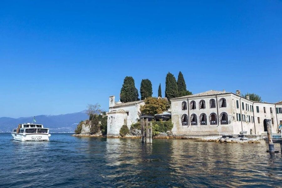 Lake Garda: Historic Castle Cruise with Wine Tasting - Lazise and the eastern shore from the boat