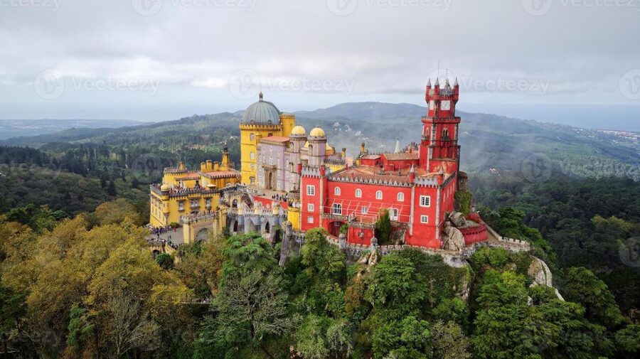 Lisbon: Sintra, Pena, Moorish Castle, Regaleira & Cascais - Pena Palace and its colorful hilltop setting