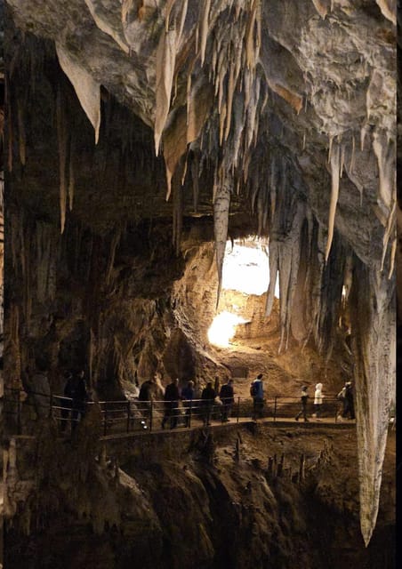 Ljubljana to Postojna Cave,Predjama Castle and Postojna park - Entering the 24.34-kilometre Postojna Cave system