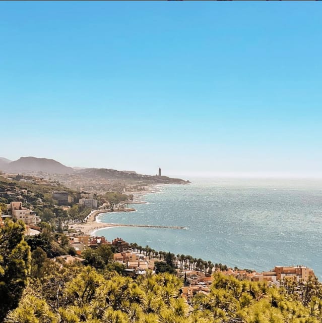 Malaga: Castle Hill and Fisherman Village E-Bike Tour - Ending at modern Muelle Uno