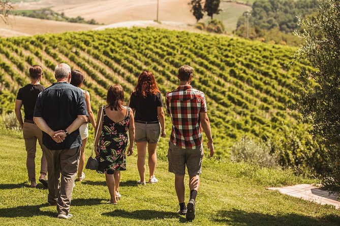 Montalcino: Castle and Vineyards Tour with Tasting - Following the Walls to the Peruzzi Bridge