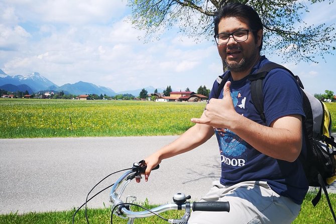 Neuschwanstein Castle by Bus Incl. Bike Ride or Hohenschwangau - The climb to Marienbrücke