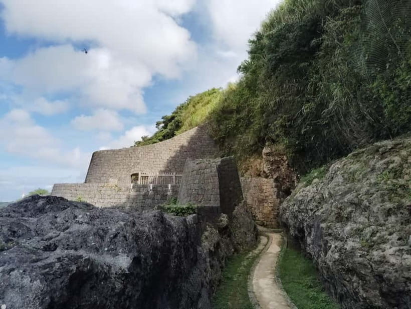 Okinawa: Urasoe Castle, Royal Tomb & War History Walk - Walk toward Urasoe Castle and the seiden