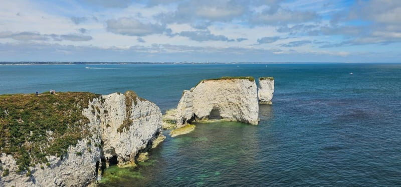 Poole: Old Harry Rocks and Corfé Castle Guided E-bike Tour - Sandbanks and its long sweep of beach