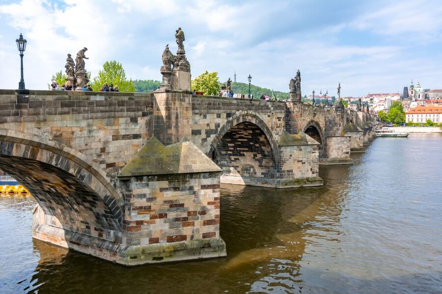 Prague: 3-Hour Old Town and Prague Castle Tour in German - Clementinum, Charles Bridge, and the move west