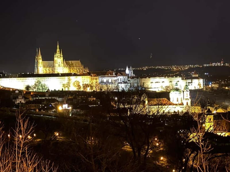 Prague: Night Walk through Prague Castle with City Views - Hradčany Square and Prague glowing below