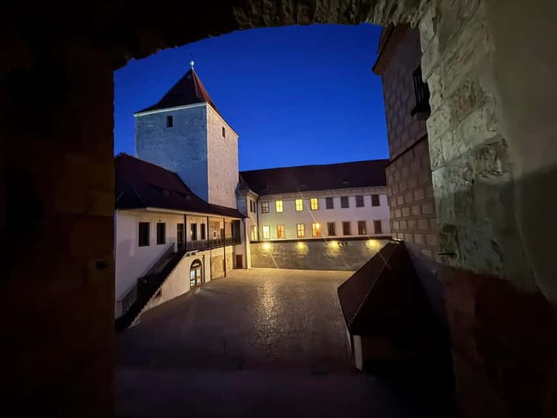 Prague: Night Walk through Prague Castle with City Views - The royal courtyards and the New Royal Palace