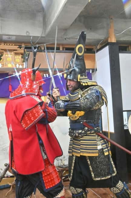 Samurai Armor & Sword experience with phot near Osaka Castle - Wearing armor and holding the samurai pose