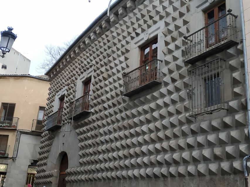 Segovia: Guided Walking Tour with Cathedral & Alcázar Entry - Starting beneath Segovia’s Roman Aqueduct