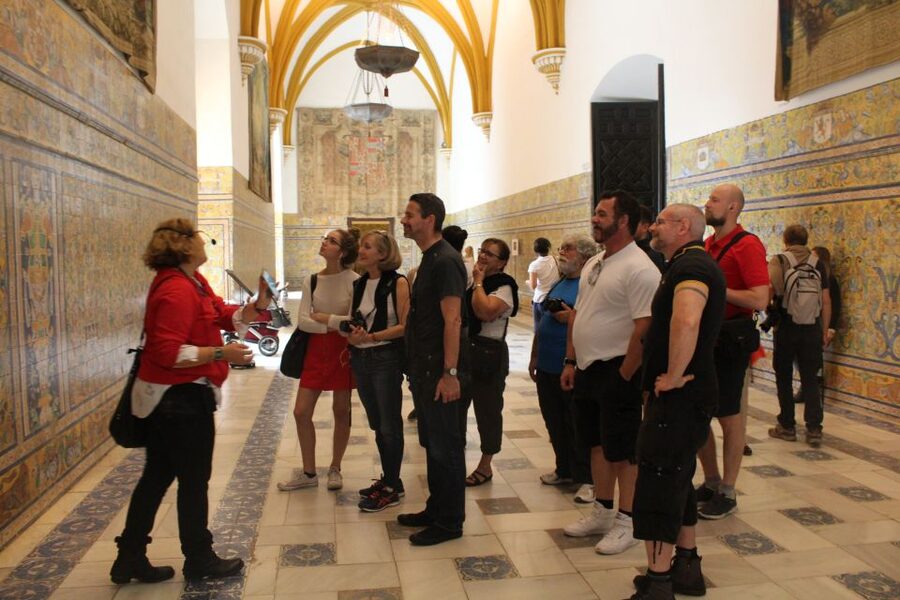 Seville: Royal Alcazar, Cathedral, and Giralda Tower Tour - The short walk through Seville’s grand plazas