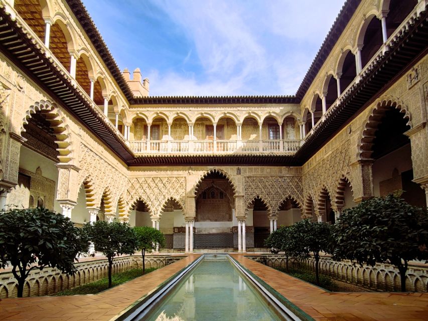 Seville: Small-Group Alcázar Guided Tour & Entry Ticket - Meeting beneath Seville’s great landmarks