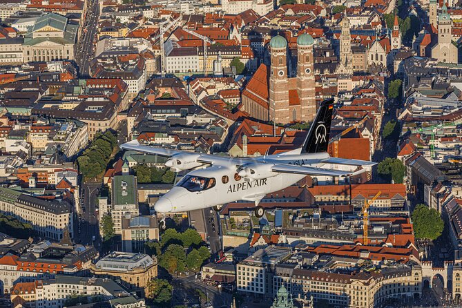 Sightseeing flight Zugspitze Neuschwanstein Castle Alps Munich Augsburg - The northern Alps and their blue lakes
