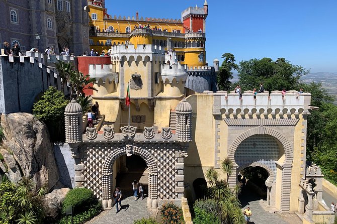 Sintra Cascais Private Tour with Pena Palace and Mouros Castle - A short walk through Sintra’s old center