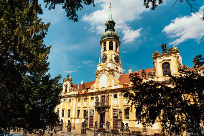 The History of Prague: Prague Castle & Castle District Private Tour - Walking through gardens toward St. Vitus Cathedral