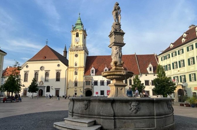The Story of Bratislava: City and Castle Walking Tour with Locals - Hlavné námestie and the old town’s center