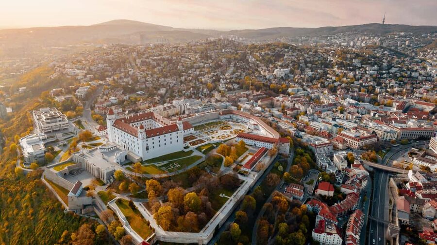 Vienna: Guided Bratislava & Devín Castle Tour via Hainburg - Bratislava Castle above the river